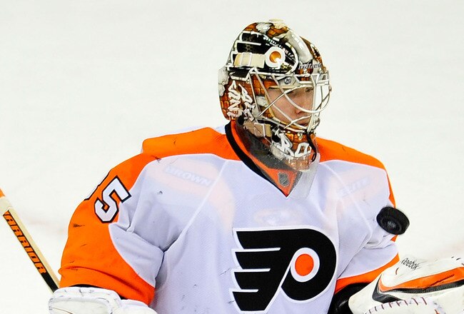 RALEIGH, NC - JANUARY 10:  Goalkeeper Sergei Bobrovsky #35 of the Philadelphia Flyers bobbles the puck as he makes a save against the Carolina Hurricanes during play at the RBC Center on January 10, 2012 in Raleigh, North Carolina. The Flyers won 2-1.  (Photo by Grant Halverson/Getty Images)