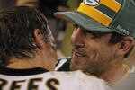 GREEN BAY, WI - SEPTEMBER 08: Aaron Rodgers #12 of the Green Bay Packers talks with Drew Brees #9 of the New Orleans Saints after the NFL opening season game at Lambeau Field on September 8, 2011 in Green Bay, Wisconsin. The Packers defeated the Saints 42-34. (Photo by Jonathan Daniel/Getty Images)