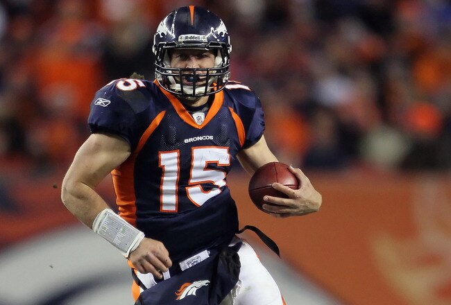 DENVER, CO - JANUARY 08:  Quarterback Tim Tebow #15 of the Denver Broncos carries the ball during the AFC Wild Card Playoff game against the Pittsburgh Steelers at Sports Authority Field at Mile High on January 8, 2012 in Denver, Colorado.  (Photo by Jeff Gross/Getty Images)