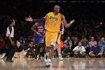 LOS ANGELES, CA - DECEMBER 29:  Kobe Bryant #24 of the Los Angeles Lakers gestures after making a basket and being fouled in the second half against the New York Knicks at Staples Center on December 29, 2011 in Los Angeles, California. NOTE TO USER: User expressly acknowledges and agrees that, by downloading and or using this photograph, User is consenting to the terms and conditions of the Getty Images License Agreement.  (Photo by Jeff Gross/Getty Images)