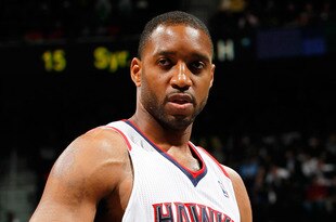 ATLANTA, GA - DECEMBER 28:  Tracy McGrady #1 of the Atlanta Hawks walks on the court against the Washington Wizards at Philips Arena on December 28, 2011 in Atlanta, Georgia.  NOTE TO USER: User expressly acknowledges and agrees that, by downloading and or using this photograph, User is consenting to the terms and conditions of the Getty Images License Agreement.  (Photo by Kevin C. Cox/Getty Images)