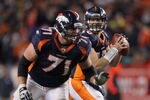DENVER, CO - JANUARY 08:  Quarterback Tim Tebow #15 of the Denver Broncos drops back to pass during the AFC Wild Card Playoff game at Sports Authority Field against the Pittsburgh Steelers at Mile High on January 8, 2012 in Denver, Colorado.  (Photo by Jeff Gross/Getty Images)