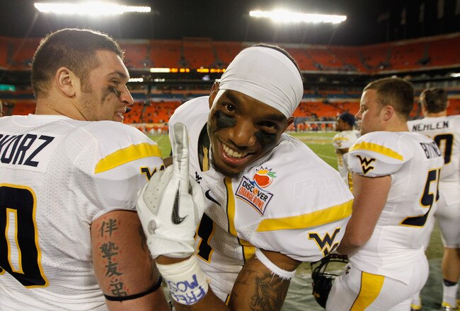 MIAMI GARDENS, FL - JANUARY 04:  J.D. Woods #81 of the West Virginia Mountaineers celebrates West Virginia's 70-33 win against the Clemson Tigers during the Discover Orange Bowl at Sun Life Stadium on January 4, 2012 in Miami Gardens, Florida.  (Photo by Streeter Lecka/Getty Images)