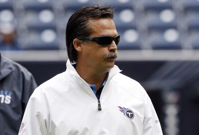 HOUSTON - NOVEMBER 28:  Head coach Jeff Fisher of the Tennessee Titans watches during pre-game warm ups before playing the Houston Texans at Reliant Stadium on November 28, 2010 in Houston, Texas.  (Photo by Bob Levey/Getty Images)