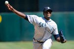 OAKLAND, CA - SEPTEMBER 03: Michael Pineda #36 of the Seattle Mariners pitches against the Oakland Athletics in the first inning during an MLB baseball game at O.co Coliseum on September 3, 2011 in Oakland, California.  (Photo by Thearon W. Henderson/Getty Images)