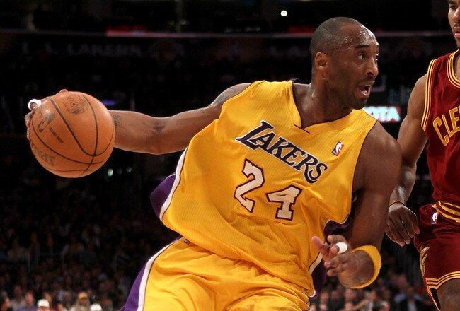 LOS ANGELES, CA - JANUARY 11:  Kobe Bryant #24 of the Los Angeles Lakers drives against Ramon Sessions #3 of the Cleveland Cavaliers at Staples Center on January 11, 2011 in Los Angeles, California.  The Lakers won 112-57.  NOTE TO USER: User expressly acknowledges and agrees that, by downloading and or using this photograph, User is consenting to the terms and conditions of the Getty Images License Agreement.  (Photo by Stephen Dunn/Getty Images)