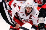 OTTAWA, ON - NOVEMBER 27:  Eric Staal #12 of the Carolina Hurricanes watches intently at a faceoff  in a game against the Ottawa Senators at Scotiabank Place on November 27, 2011 in Ottawa, Canada.  (Photo by Phillip MacCallum/Getty Images)
