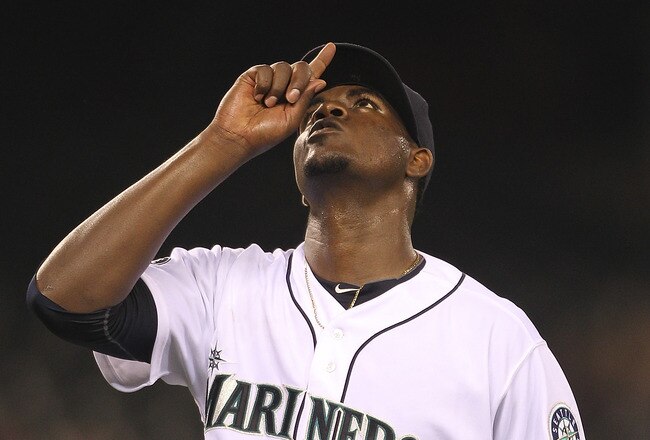 SEATTLE - SEPTEMBER 10:  Starting pitcher Michael Pineda #36 of the Seattle Mariners points skyward after getting Billy Butler of the Kansas City Royals to fly out to end the eighth inning at Safeco Field on September 10, 2011 in Seattle, Washington. (Photo by Otto Greule Jr/Getty Images)