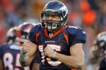 DENVER, CO - JANUARY 08:  Tim Tebow #15 of the Denver Broncos celebrates his second quarter rushing touchdown against the Pittsburgh Steelers at Sports Authority Field at Mile High on January 8, 2012 in Denver, Colorado. The Broncos defeated the Steelers 29-23 in overtime.  (Photo by Doug Pensinger/Getty Images)