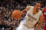DENVER, CO - JANUARY 13:  Andre Miller #24 of the Denver Nuggets controls the ball against the Miami Heat at the Pepsi Center on January 13, 2012 in Denver, Colorado. The Nuggets defeated the Heat 117-104. NOTE TO USER: User expressly acknowledges and agrees that, by downloading and or using this photograph, User is consenting to the terms and conditions of the Getty Images License Agreement.  (Photo by Doug Pensinger/Getty Images)