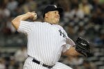 NEW YORK, NY - SEPTEMBER 22:  Bartolo Colon #40 of the New York Yankees pitches against the Tampa Bay Rays on September 22, 2011 at Yankee Stadium in the Bronx borough of New York City.  (Photo by Jim McIsaac/Getty Images)