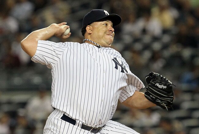 NEW YORK, NY - SEPTEMBER 22:  Bartolo Colon #40 of the New York Yankees pitches against the Tampa Bay Rays on September 22, 2011 at Yankee Stadium in the Bronx borough of New York City.  (Photo by Jim McIsaac/Getty Images)