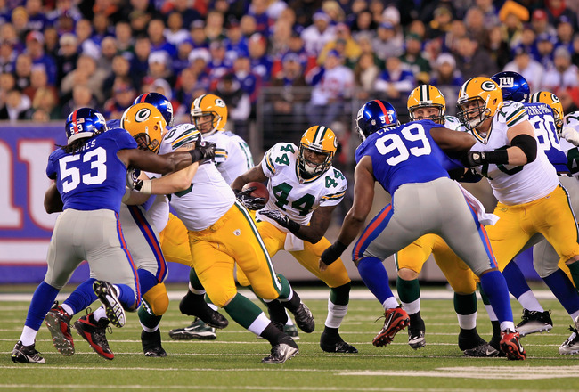 EAST RUTHERFORD, NJ - DECEMBER 04:  James Starks #44 of the Green Bay Packers runs the ball against the New York Giants at MetLife Stadium on December 4, 2011 in East Rutherford, New Jersey.  (Photo by Chris Trotman/Getty Images)