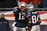 FOXBORO, MA - JANUARY 14:  (L-R) Tom Brady #12 and Deion Branch #84 of the New England Patriots celebrate after Branch caught a 61-yard touchdown pass from Brady in the second quarter against the Denver Broncos during their AFC Divisional Playoff Game at Gillette Stadium on January 14, 2012 in Foxboro, Massachusetts.  (Photo by Al Bello/Getty Images)