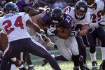 BALTIMORE, MD - OCTOBER 16:  Ray Rice #27 of the Baltimore Ravens runs the ball against Andrew Gardner #66 and Johnathan Joseph #24 of the Houston Texans at M&T Bank Stadium on October 16, 2011 in Baltimore, Maryland.  (Photo by Rob Carr/Getty Images)