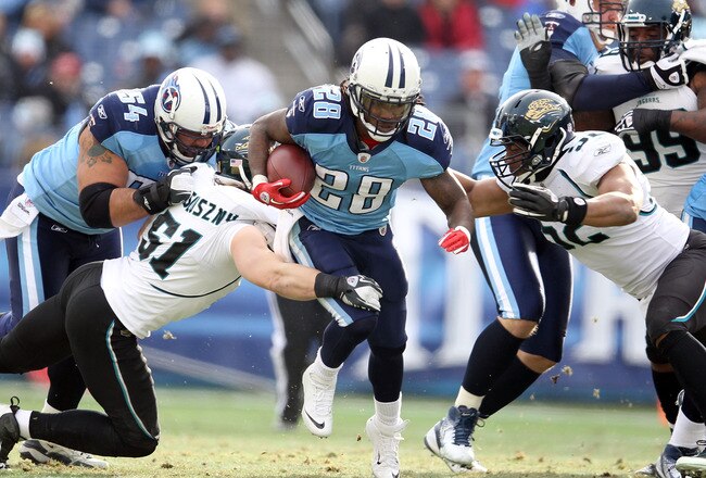 NASHVILLE, TN - DECEMBER 24:  Chris Johnson #28 of the Tennessee Titans runs with the ball during the NFL game against the Jacksonville Jaguars at LP Field on December 24, 2011 in Nashville, Tennessee.  (Photo by Andy Lyons/Getty Images)