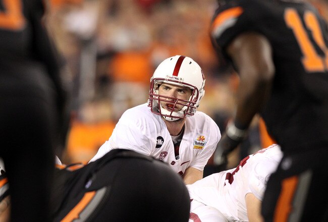 GLENDALE, AZ - JANUARY 02:  Andrew Luck #12 of the Stanford Cardinal calls signals out at the line of scrimmage as he awaits the snap against the Oklahoma State Cowboys during the Tostitos Fiesta Bowl on January 2, 2012 at University of Phoenix Stadium in Glendale, Arizona.  (Photo by Christian Petersen/Getty Images)