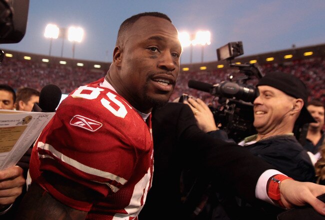 SAN FRANCISCO, CA - JANUARY 14:  Vernon Davis #85 of the San Francisco 49ers leaves the field after winning the NFC Divisional playoff game 36-32 over the New Orleans Saints at Candlestick Park on January 14, 2012 in San Francisco, California.  (Photo by Jed Jacobsohn/Getty Images)