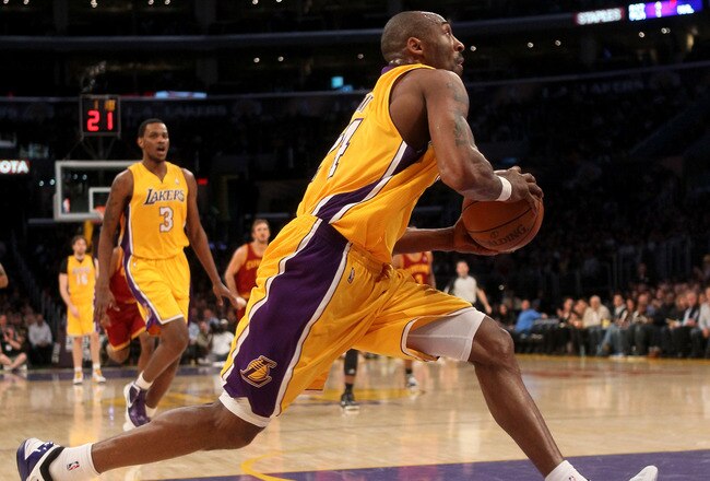 LOS ANGELES, CA - JANUARY 13:  Kobe Bryant #24 of the Los Angeles Lakers drives in for a basket against the Cleveland Cavaliers at Staples Center on January 13, 2012 in Los Angeles, California.  NOTE TO USER: User expressly acknowledges and agrees that, by downloading and or using this photograph, User is consenting to the terms and conditions of the Getty Images License Agreement.  (Photo by Stephen Dunn/Getty Images)