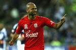 MELBOURNE, AUSTRALIA - JANUARY 13:  Serjinho Van Dijk of Adelaide celebrates after scoring a goal during the round 14 A-League match between the Melbhourne Victory and Adelaide United at AAMI Park on January 13, 2012 in Melbourne, Australia.  (Photo by Robert Prezioso/Getty Images)