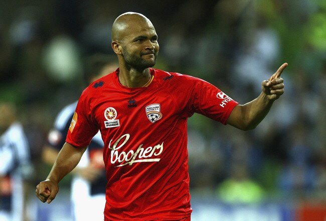 MELBOURNE, AUSTRALIA - JANUARY 13:  Serjinho Van Dijk of Adelaide celebrates after scoring a goal during the round 14 A-League match between the Melbhourne Victory and Adelaide United at AAMI Park on January 13, 2012 in Melbourne, Australia.  (Photo by Robert Prezioso/Getty Images)