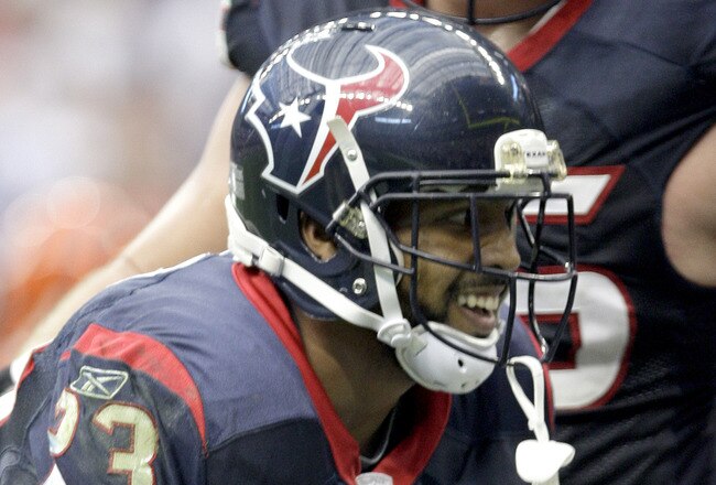 HOUSTON, TX - JANUARY 7: Running back Arian Foster #23 of the Houston Texans bows after he scores a touchdown against the Cincinnati Bengals during their 2012 AFC Wild Card Playoff game at Reliant Stadium on January 7, 2012 in Houston, Texas. Texas won 31 to 10. (Photo by Thomas B. Shea/Getty Images)