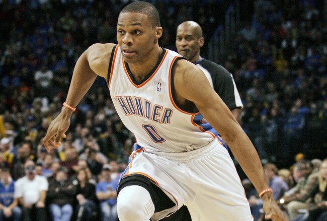 OKLAHOMA CITY, OK -DECEMBER 25:  Russell Westbrook #0 of the Oklahoma City Thunder drives inside during the NBA season opening game against the Orlando Magic December 25, 2011 at the Chesapeake Energy Arena in Oklahoma City, Oklahoma.  Oklahoma City defeated Orlando 97-89. NOTE TO USER: User expressly acknowledges and agrees that, by downloading and or using this Photograph, user is consenting to the terms and conditions of the Getty Images License Agreement.  (Photo by Brett Deering/Getty Images)