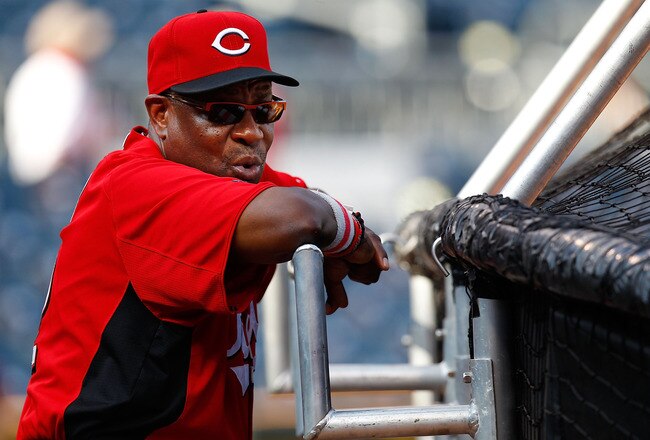 PITTSBURGH - JULY 19: Manager Dusty Baker #12 of the Cincinnati Reds watches batting practice prior to the game against the Pittsburgh Pirates on July 19, 2011 at PNC Park in Pittsburgh, Pennsylvania.  (Photo by Jared Wickerham/Getty Images)