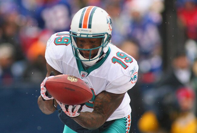 ORCHARD PARK, NY - DECEMBER 18:  Brandon Marshall #19 of the Miami Dolphins drops a touchdown pass against the Buffalo Bills at Ralph Wilson Stadium  on December 18, 2011 in Orchard Park, New York.  (Photo by Rick Stewart/Getty Images)