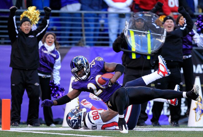 BALTIMORE, MD - JANUARY 15:  Ed Reed #20 of the Baltimore Ravens intercepts a pass intended for  Andre Johnson #80 of the Houston Texans during the fourth quarter of the AFC Divisional playoff game at M&T Bank Stadium on January 15, 2012 in Baltimore, Maryland. The Ravens defeated the Texans 20-13. (Photo by Chris Trotman/Getty Images)