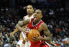 CHARLOTTE, NC - JANUARY 06:  Jeff Teague #0 of the Atlanta Hawks against the Charlotte Bobcats during their game at Time Warner Cable Arena on January 6, 2012 in Charlotte, North Carolina.  NOTE TO USER: User expressly acknowledges and agrees that, by downloading and or using this photograph, User is consenting to the terms and conditions of the Getty Images License Agreement.  (Photo by Streeter Lecka/Getty Images)