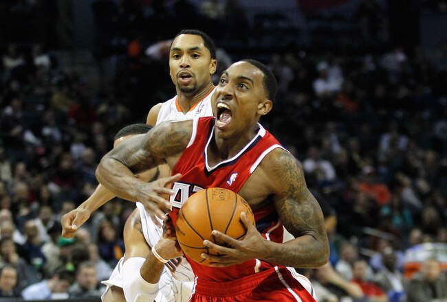 CHARLOTTE, NC - JANUARY 06:  Jeff Teague #0 of the Atlanta Hawks against the Charlotte Bobcats during their game at Time Warner Cable Arena on January 6, 2012 in Charlotte, North Carolina.  NOTE TO USER: User expressly acknowledges and agrees that, by downloading and or using this photograph, User is consenting to the terms and conditions of the Getty Images License Agreement.  (Photo by Streeter Lecka/Getty Images)