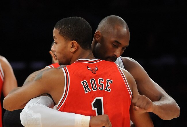 LOS ANGELES, CA - DECEMBER 25:  Kobe Bryant #24 of the Los Angeles Lakers greets Derrick Rose #1 of the Chicago Bulls before the game at Staples Center on December 25, 2011 in Los Angeles, California.  NOTE TO USER: User expressly acknowledges and agrees that, by downloading and or using this photograph, User is consenting to the terms and conditions of the Getty Images License Agreement.  (Photo by Lisa Blumenfeld/Getty Images)