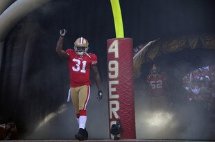 SAN FRANCISCO, CA - JANUARY 14:  Donte Whitner #31 of the San Francisco 49ers is introduced to the fans before the start of the Divisional Playoffs against the New Orleans Saints at Candlestick Park on January 14, 2012 in San Francisco, California. The 49ers won the game 36-32. (Photo by Thearon W. Henderson/Getty Images)