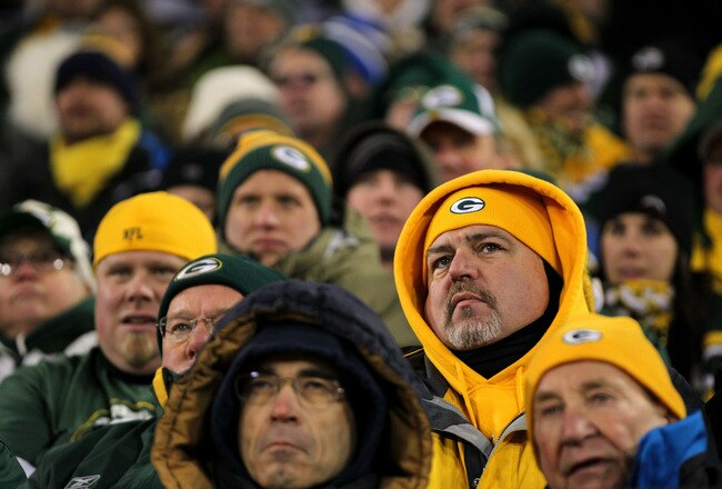 GREEN BAY, WI - JANUARY 15:  A fan of the Green Bay Packers looks on towards the end of the game against the New York Giants during their NFC Divisional playoff game at Lambeau Field on January 15, 2012 in Green Bay, Wisconsin.  (Photo by Jamie Squire/Getty Images)