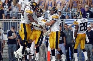 STATE COLLEGE, PA - OCTOBER 8:  Micah Hyde #18 of the Iowa Hawkeyes  celebrats his second half interception against the Penn State Nittany Lions during the game on October 8, 2011 at Beaver Stadium in State College, Pennsylvania.  The Lions defeated the Hawkeyes 13-3.  (Photo by Justin K. Aller/Getty Images)