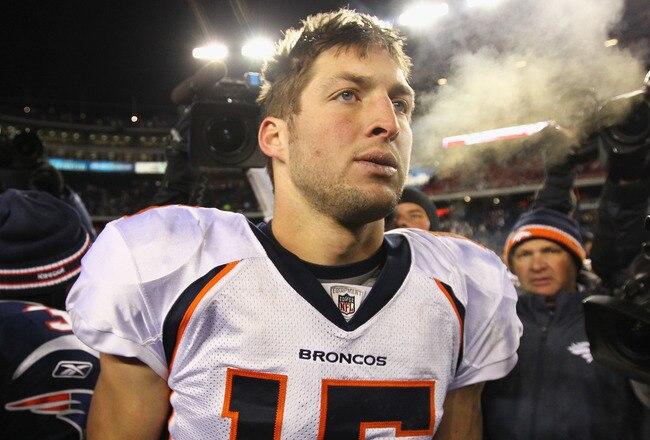 FOXBORO, MA - JANUARY 14:  Tim Tebow #15 of the Denver Broncos looks on after the Broncos lost 45-10 against the New England Patriots during their AFC Divisional Playoff Game at Gillette Stadium on January 14, 2012 in Foxboro, Massachusetts.  (Photo by Al Bello/Getty Images)