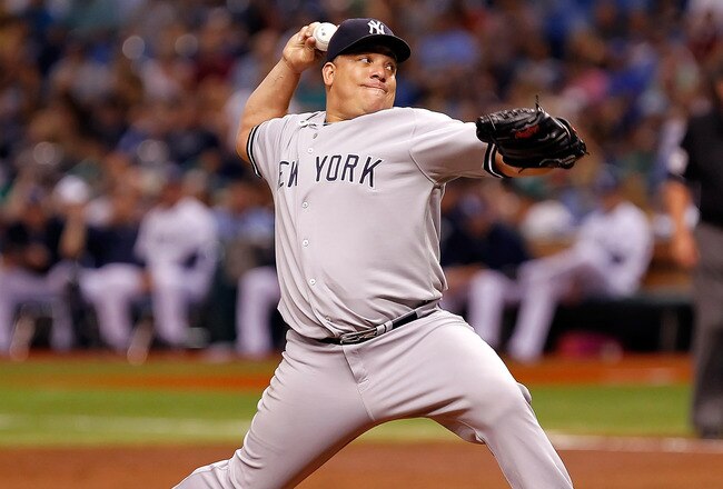 ST PETERSBURG, FL - SEPTEMBER 27:  Pitcher Bartolo Colon #40 of the New York Yankees pitches against the Tampa Bay Rays during the game at Tropicana Field on September 27, 2011 in St. Petersburg, Florida.  (Photo by J. Meric/Getty Images)