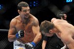 DALLAS - SEPTEMBER 19:  UFC fighter Vitor Belfort  (L) battles UFC fighter Rich Franklin (R) during their Catch weight bout at UFC 103: Franklin vs. Belfort at the American Airlines Center on September 19, 2009 in Dallas, Texas.  (Photo by Jon Kopaloff/Getty Images)