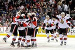 MONTREAL, CANADA - JANUARY 14:  Members of the Ottawa Senators celebrate the game winning goal by teammate Daniel Alfredsson #11 during the NHL game against the Montreal Canadiens at the Bell Centre on January 14, 2012 in Montreal, Quebec, Canada.  The Senators defeated the Canadiens 3-2 in a shootout.  (Photo by Richard Wolowicz/Getty Images)