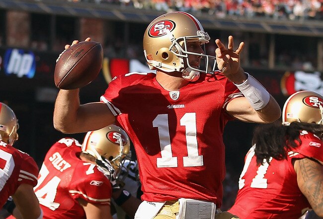 SAN FRANCISCO, CA - JANUARY 14:  Alex Smith #11 of the San Francisco 49ers looks to pass from the pocket in the first quarter against the New Orleans Saints during the NFC Divisional playoff game at Candlestick Park on January 14, 2012 in San Francisco, California.  (Photo by Ezra Shaw/Getty Images)