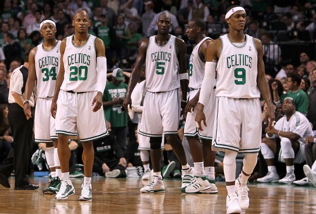 BOSTON - MAY 28:  (L-R) Paul Pierce #34, Ray Allen #20, Kevin Garnett #5 and Rajon Rondo #9 of the Boston Celtics look on against the Orlando Magic in Game Six of the Eastern Conference Finals during the 2010 NBA Playoffs at TD Garden on May 28, 2010 in Boston, Massachusetts.  NOTE TO USER: User expressly acknowledges and agrees that, by downloading and/or using this Photograph, user is consenting to the terms and conditions of the Getty Images License Agreement.  (Photo by Jim Rogash/Getty Images)