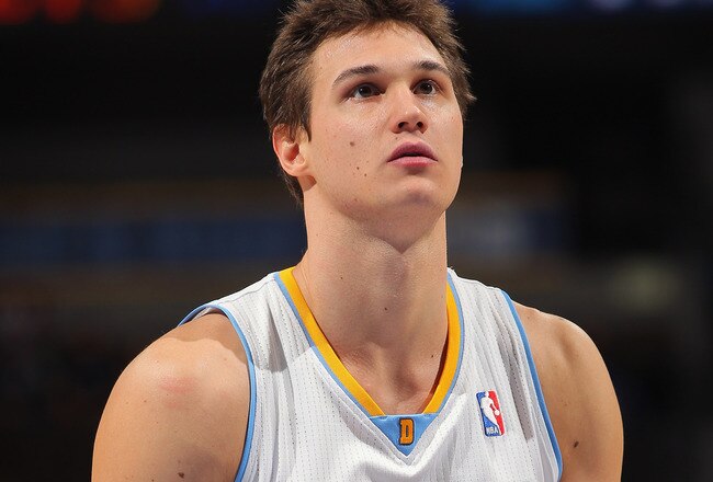 DENVER, CO - JANUARY 09:  Danilo Gallinari #8 of the Denver Nuggets takes a free throw against the New Orleans Hornets at the Pepsi Center on January 9, 2012 in Denver, Colorado. The Hornets defeated the Nuggets 94-81. NOTE TO USER: User expressly acknowledges and agrees that, by downloading and or using this photograph, User is consenting to the terms and conditions of the Getty Images License Agreement.  (Photo by Doug Pensinger/Getty Images)