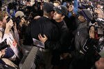 BALTIMORE, MD - NOVEMBER 24:  Head coach Jim Harbaugh of the San Francisco 49ers (L) hugs his brother head coach John Harbaugh of the Baltimore Ravens (R) after the Ravens defeated the 49ers 16-6 at M&T Bank Stadium on November 24, 2011 in Baltimore, Maryland.  (Photo by Rob Carr/Getty Images)