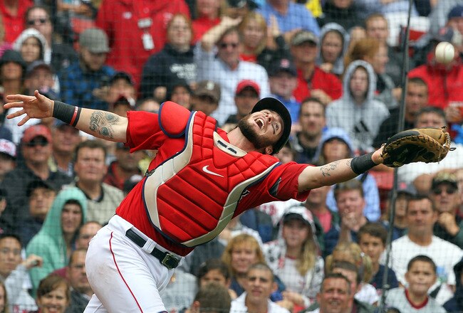 BOSTON - AUGUST 16:  Jarrod Saltalamacchia #39 of the Boston Red Sox catches a  pop foul hit by Kelly Shoppach #10 of the Tampa Bay Rays in the seventh inning at Fenway Park on August 16, 2011 in Boston, Massachusetts.  (Photo by Jim Rogash/Getty Images)