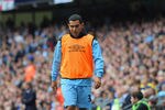 MANCHESTER, ENGLAND - SEPTEMBER 24:  Carlos Tevez of Manchester City looks on from the sidelines during the Barclays Premier League match between Manchester City and Everton at the Etihad Stadium on September 24, 2011 in Manchester, England.  (Photo by Michael Regan/Getty Images)