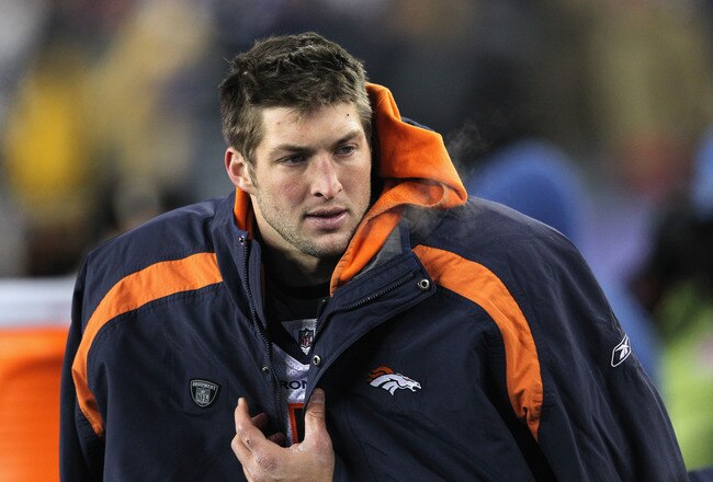FOXBORO, MA - JANUARY 14:  Tim Tebow #15 of the Denver Broncos looks on against the New England Patriots during their AFC Divisional Playoff Game at Gillette Stadium on January 14, 2012 in Foxboro, Massachusetts.  (Photo by Jim Rogash/Getty Images)