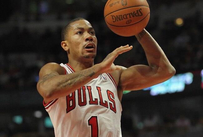 CHICAGO, IL - JANUARY 09:  Derrick Rose #1 of the Chicago Bulls goes up for a shot against the Detroit Pistons at the United Center on January 9, 2012 in Chicago, Illinois. The Bulls defeated the Pistons 92-68. NOTE TO USER: User expressly acknowledges and agrees that, by downloading and or using this photograph, User is consenting to the terms and conditions of the Getty Images License Agreement.  (Photo by Jonathan Daniel/Getty Images)