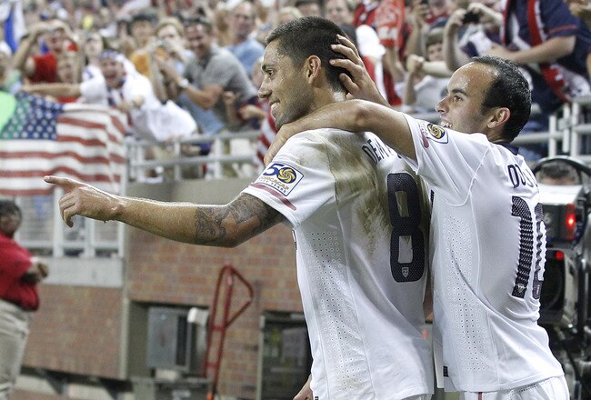 DETROIT, MI - JUNE 7: Clint Dempsey #8 of the United States celebrates a second half goal with Landon Donovan #10 while playing Canada during the 2011 Gold Cup  at Ford Field on June 7, 2011 in Detroit, Michigan. The United States won the game 2-0. (Photo by Gregory Shamus/Getty Images)