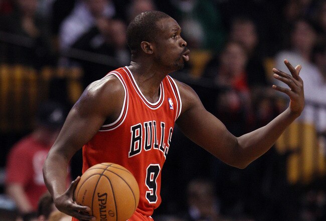 BOSTON, MA - JANUARY 13: Luol Deng #9 of the Chicago Bulls signals for his teammates to move in the first half against the Boston Celtics on January 13, 2012 at TD Garden in Boston, Massachusetts. NOTE TO USER: User expressly acknowledges and agrees that, by downloading and or using this photograph, User is consenting to the terms and conditions of the Getty Images License Agreement.  (Photo by Elsa/Getty Images)